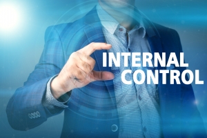 Businessman presses button internal control on virtual screens. Business, technology, internet and networking concept.